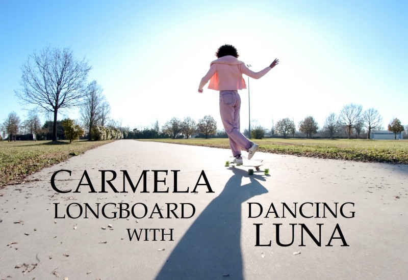 Carmela longboard dancing with Luna